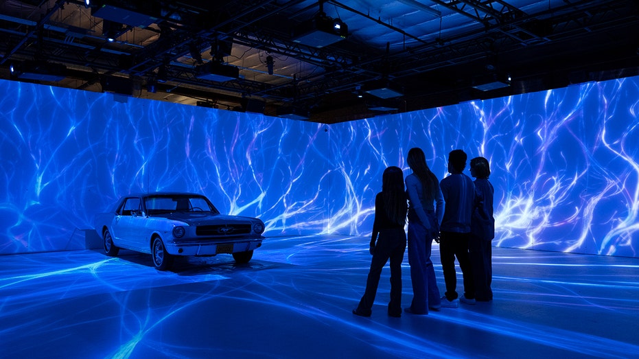 The new Mustang exhibit features Hollywood cars and immersive sensory technology