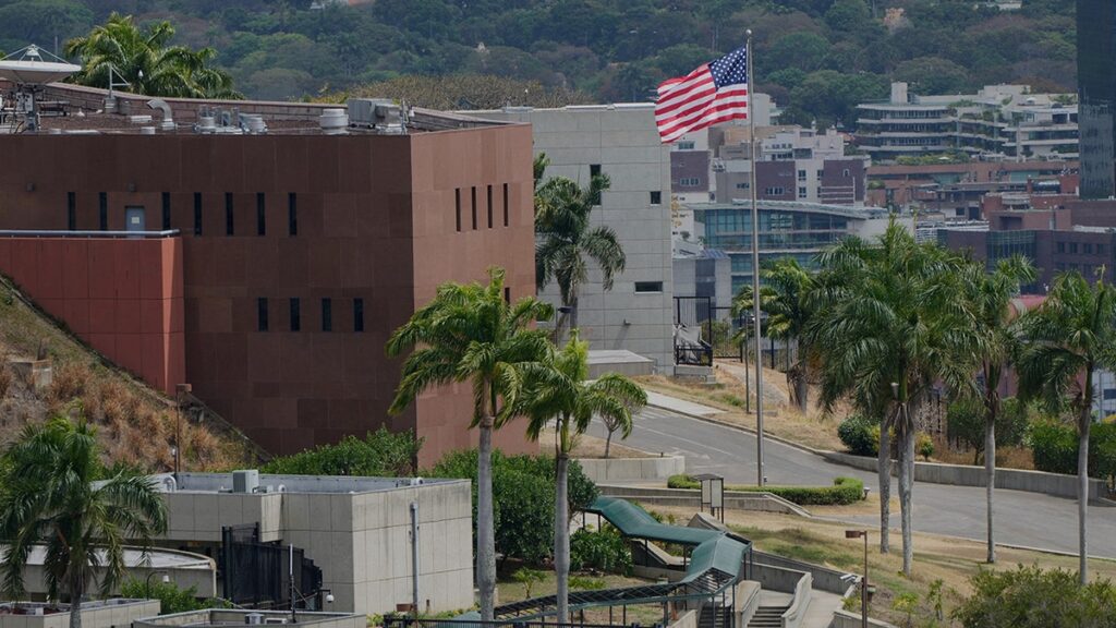 For the first time in seven years, the American flag is raised at the embassy in Venezuela