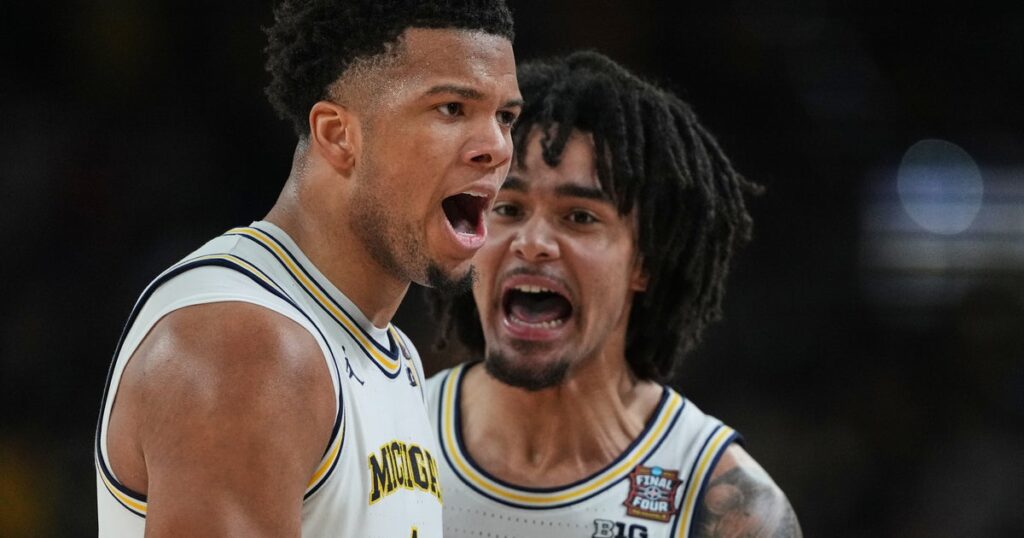 Michigan clinches its second national title and first since 1989 by defeating UConn